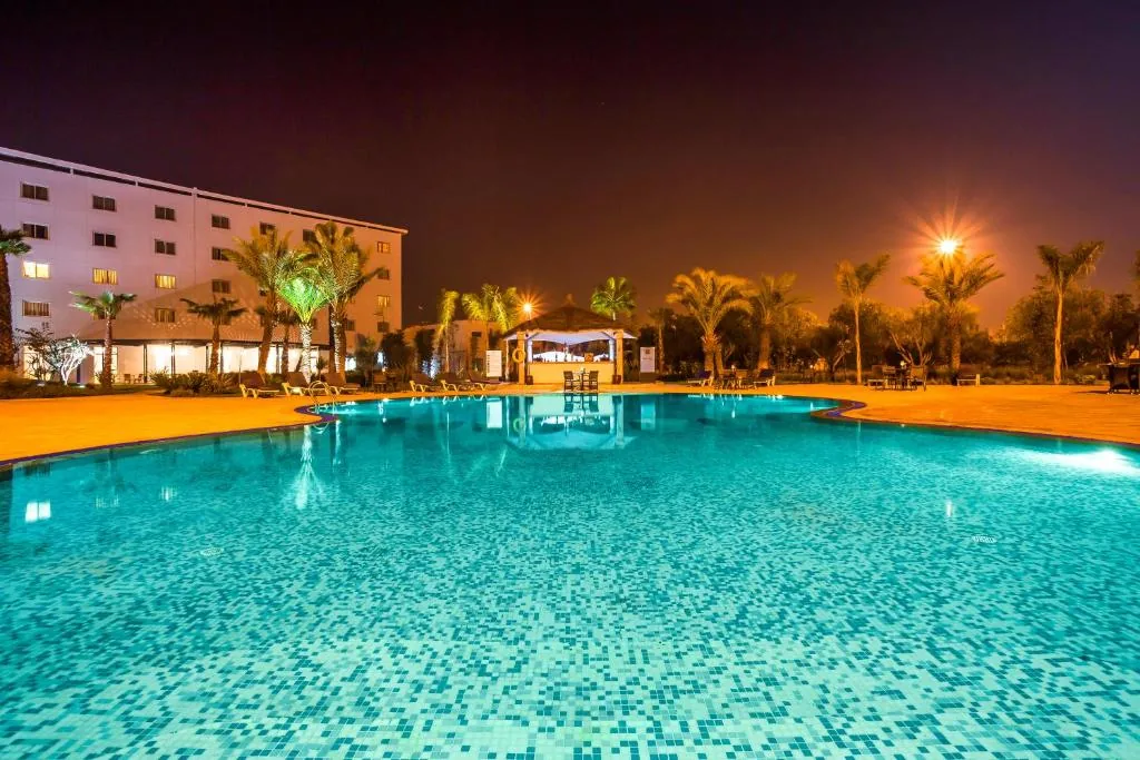 Swimming pool at night — Relax Hotel Airport Nouasseur