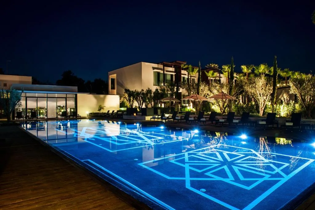 Swimming pool at night — STORY Rabat